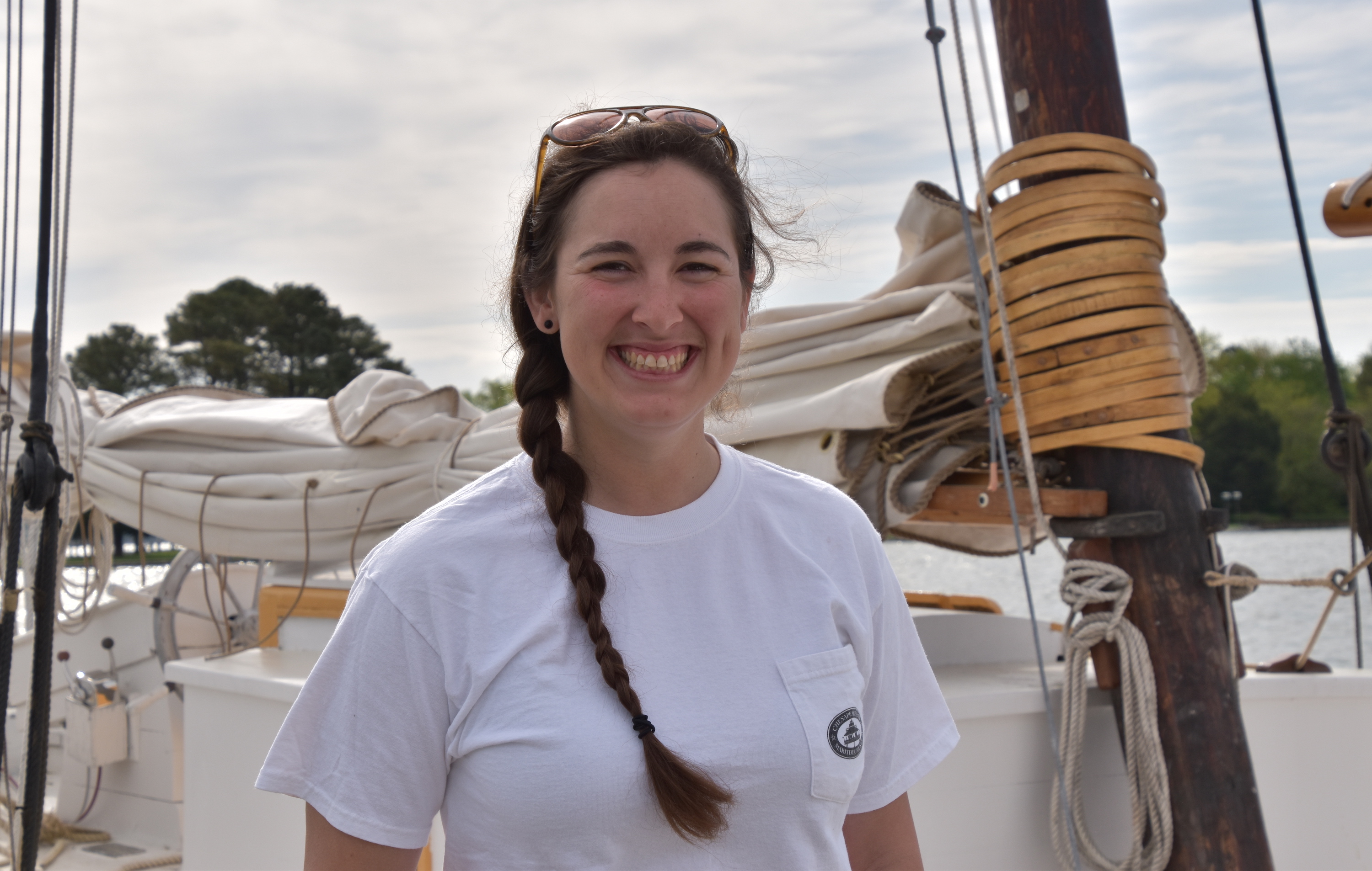 Woman boat captain behind the helm of Edna Lockwood